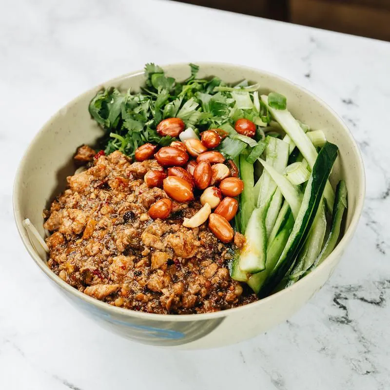 Zhajiang noodles with minced pork, peanuts, cucumber and cilantro